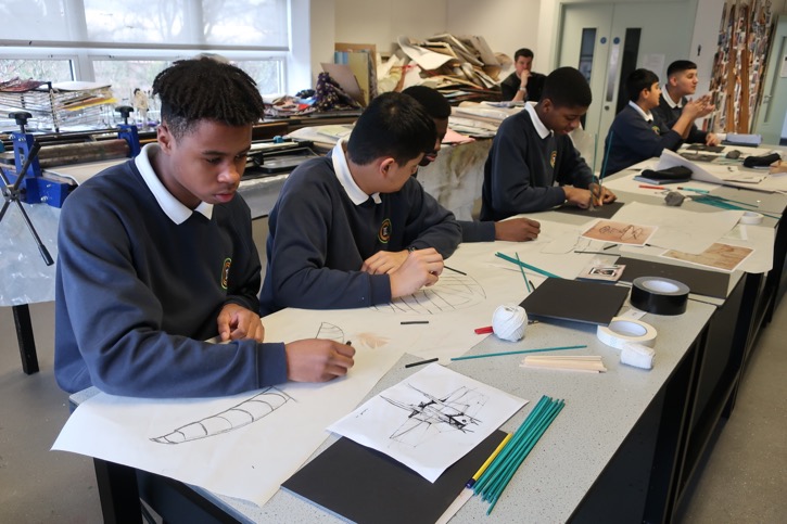 Jesmond Park Academy students sketch their ideas in charcoal